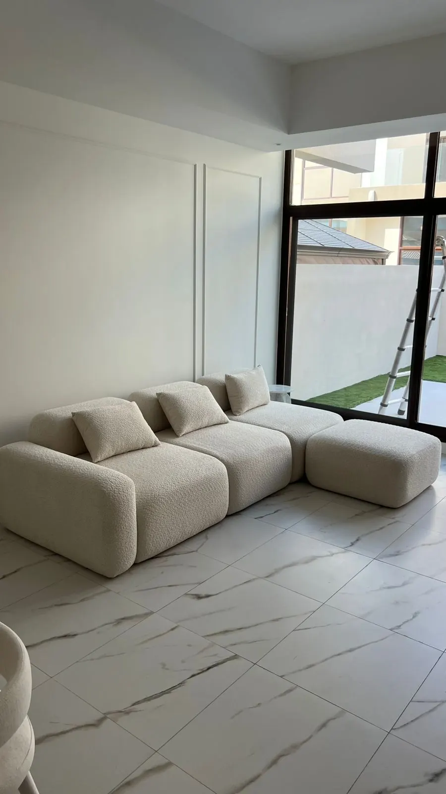 Living room with a modular sofa and floor-to-ceiling windows, Wadi Al Safa 3